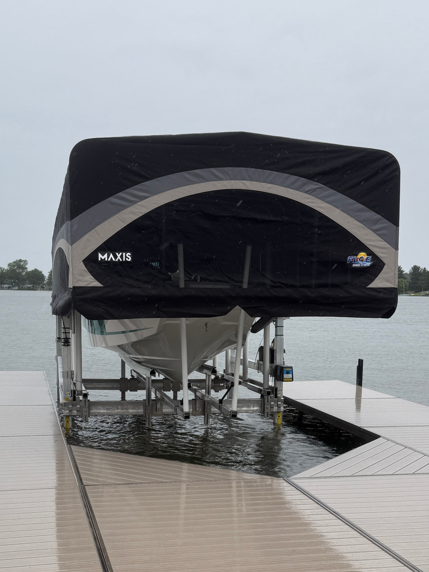 FLOE boat lift with a MAXIS canopy installed by Beach Bumz Marine on Indian Lake
