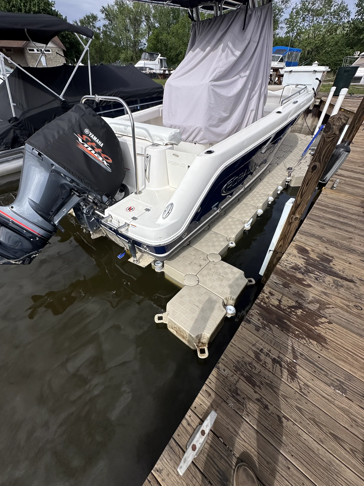 Drive-on boat system fitted beside an existing wood dock in South Haven