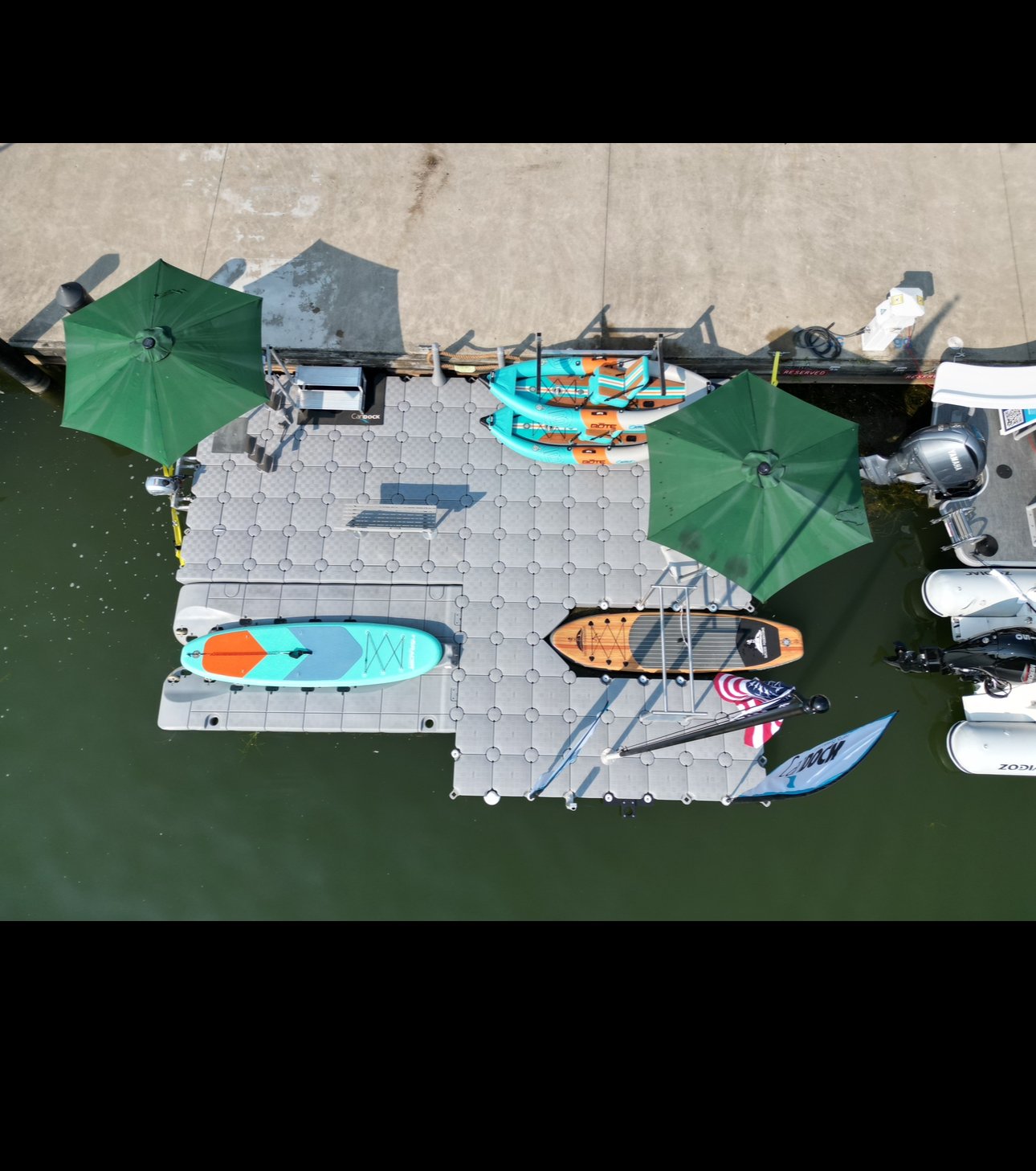 Weathered dock section being serviced on a Southwest Michigan lake
