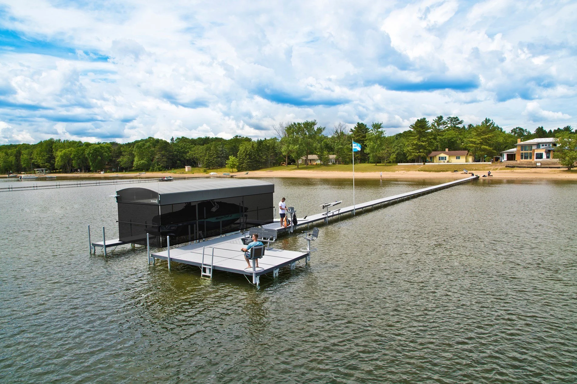 Aluminum sectional dock extending into a clear Michigan lake