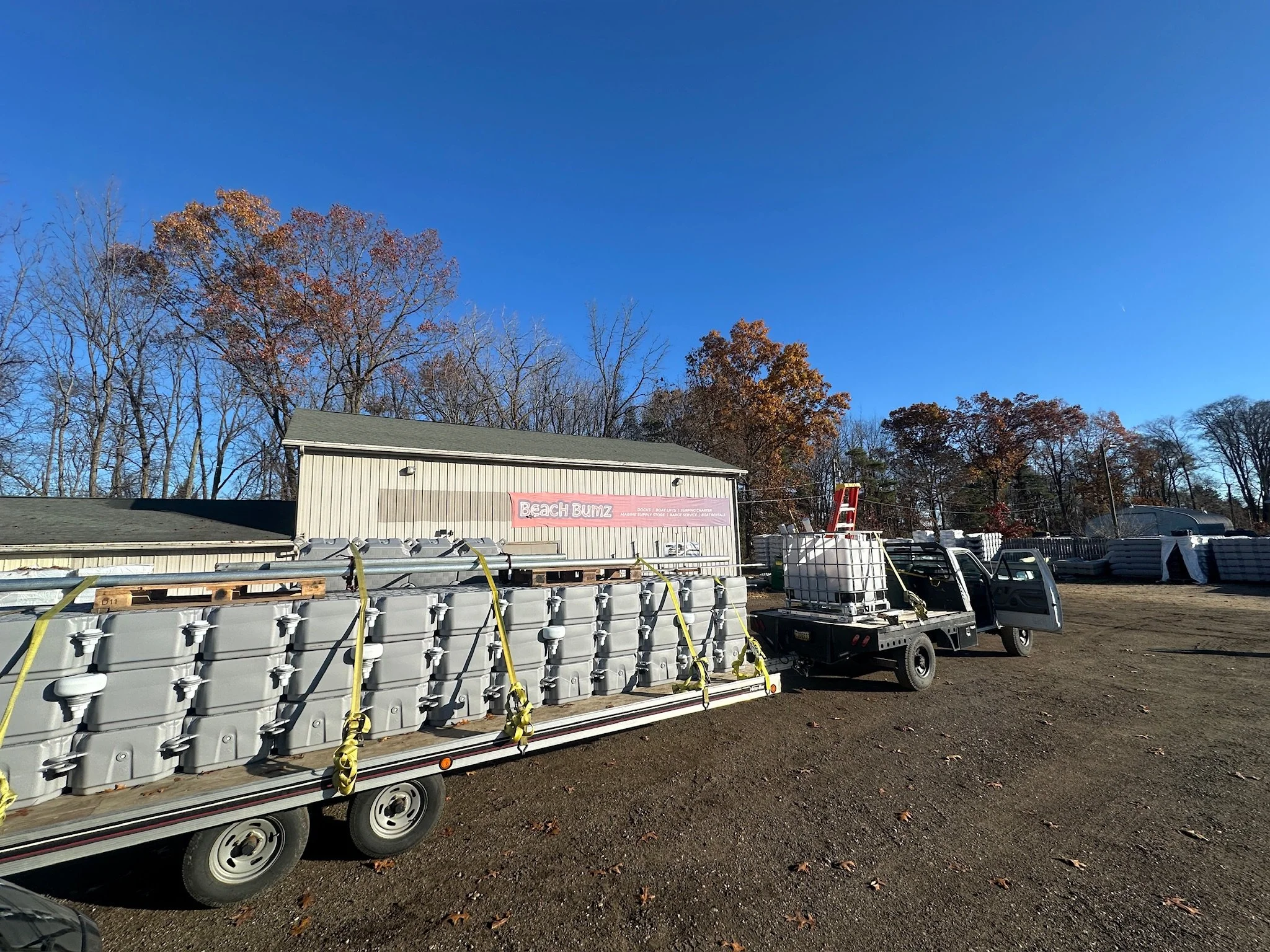 Dock and boat lift installation on a Southwest Michigan lake